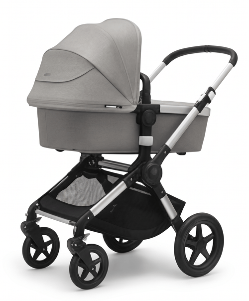 Grijze kinderwagen met reiswieg